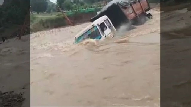 truck swept away