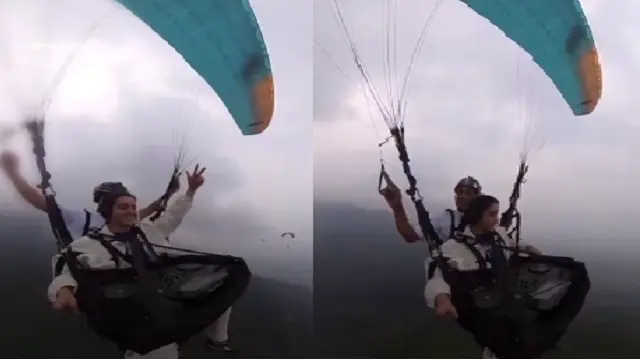 India DJ performs live music while paragliding